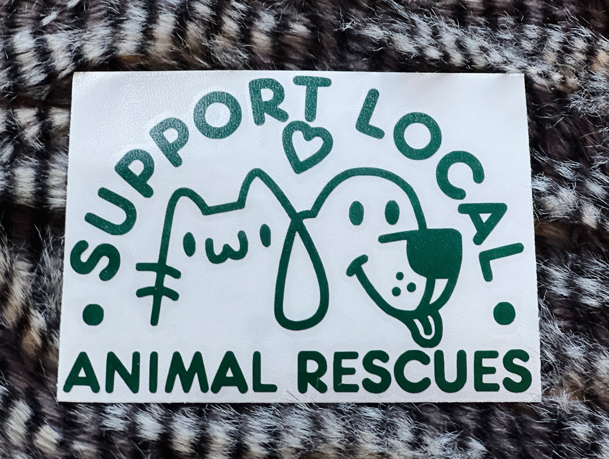 Sticker with text 'Support Local Animal Rescues' featuring a dog and cat illustration on a textured background.