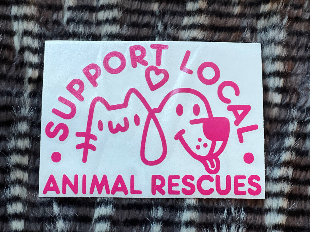 Sticker with pink text 'Support Local Animal Rescues' featuring cat and dog illustrations on a textured background.